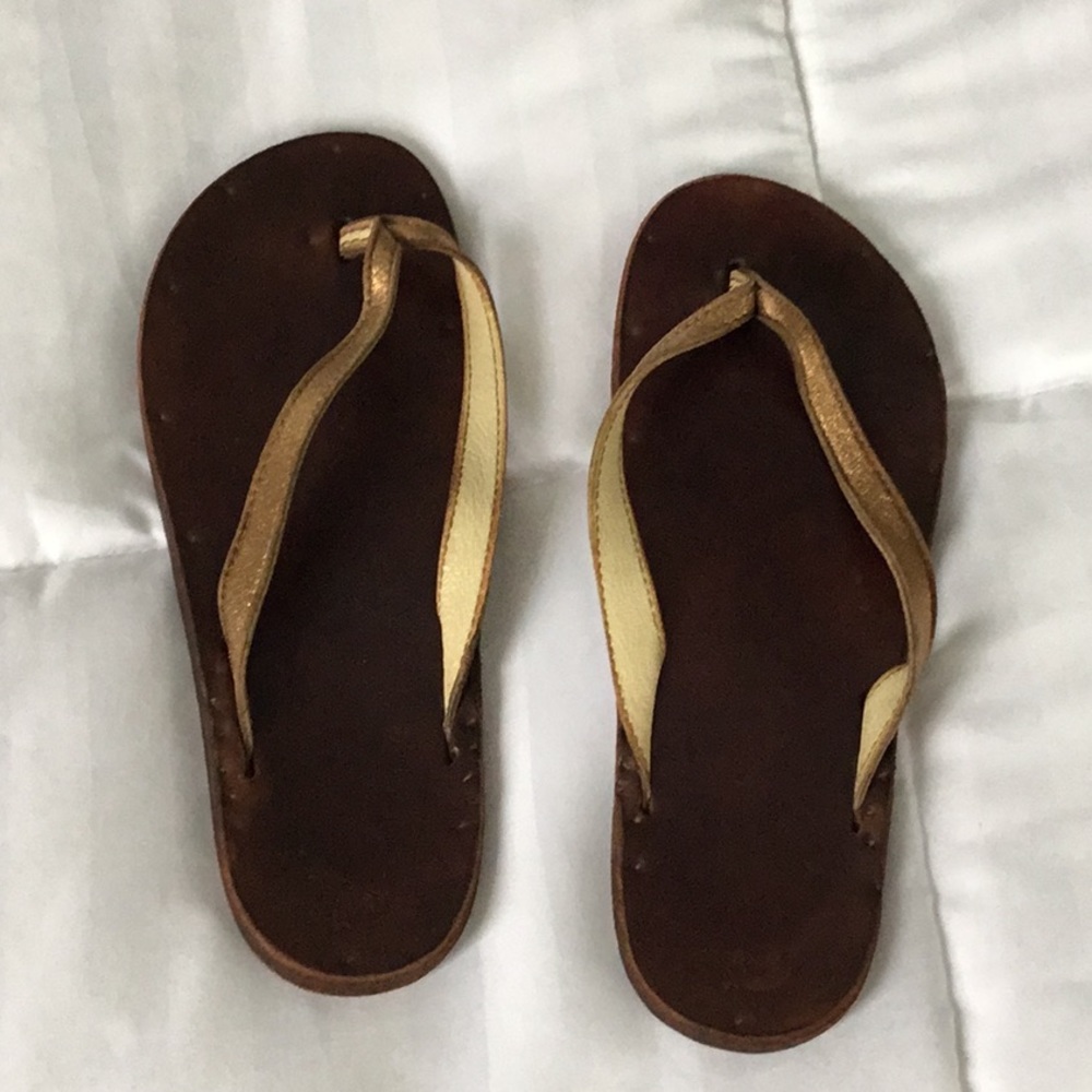 Gold colored sandal by Jutta Neumann